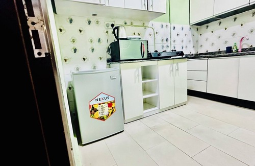 Ikeja House | Luxury Poolside Suite/1BR/Quiet Location with Free Wifi and Cable