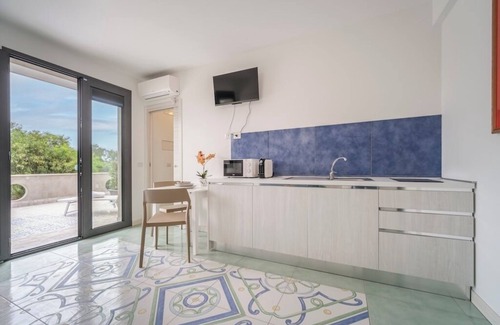 Fondachello Apartment | Luxury Studio Apartment Nausica with Swimming Pool Access