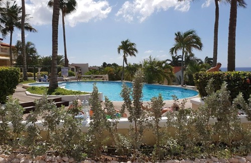 Piscadera Villa | Luxury villa with sea views in the secure Royal Palm Resort Pool