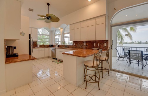 Sugarloaf Shores House | Luxury Waterfront Home with Gorgeous Pool, Tiki Bar and Sunsets
