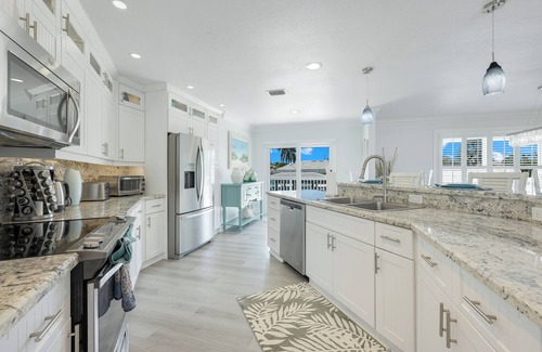 Marco Island House | Luxury Waterfront Pool Home, Walk to Beach, Kayaks SUP's, Bikes, Pool/PPong Tbl