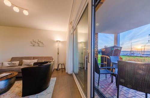 Muritz Apartment | MüritzKieker - Apartment in der Hafenresidenz mit Kamin & Wellness