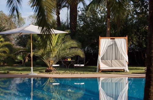 El Aggada Villa | MAGGY ROSE - Contemporary Elegance: 8 Bedrooms, Heated Pool, and Jacuzzi Bliss