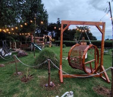 Canton Dota Ski Chalet | Magic Cabin in Jardín de Dota A real Costa Rican Farm experience with Breakfast included Trout fishing in the lagoon Fruit tasting & beautiful garden with farm animals