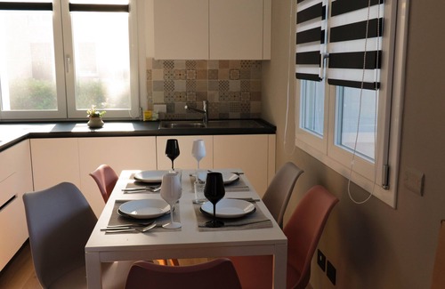 Vimercate Apartment | Magnolia: garden and parking. Vimercate/Monza