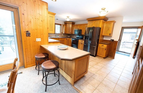 East Jordan Cabin | Main cabin + sleeping bunkhouse, heated inground pool & u-shaped driveway.