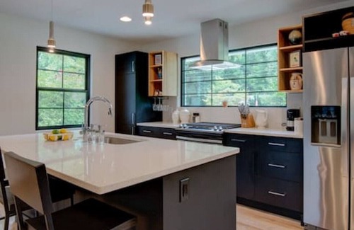 Charlotte House | Main House · Modern design meets comfort w/deck & chefs kitchen