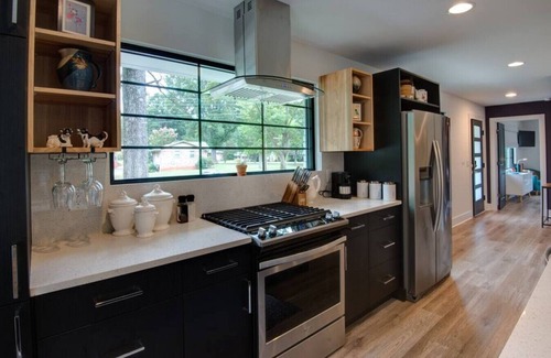 Charlotte House | Main House · Modern design meets comfort w/deck & chefs kitchen