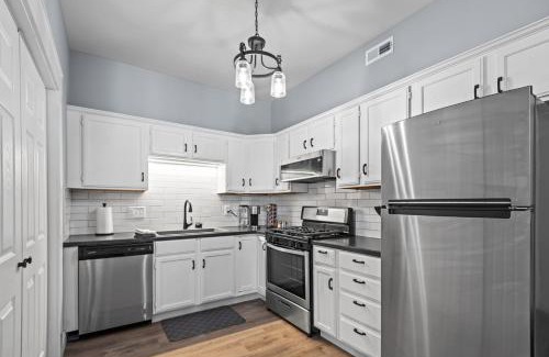 St. Charles Apartment | Main Street Balcony Apartment For up to 8 guests!