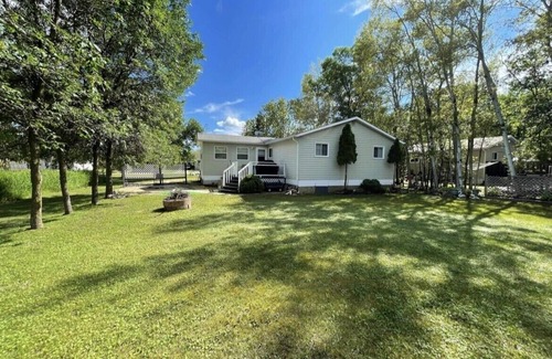 Chalet Beach Cabin | Making memories in Matlock,MB