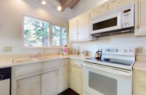 Mammoth Lakes Condo | Mammoth Estates 203 Pet-friendly Large Mountain Condo with Wood Burning Fireplace by RedAwning