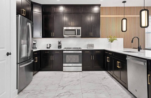 Florida Center House | Mammoth Manor | Massive home w PVT theater, arcade, spa pool - mins to top parks
