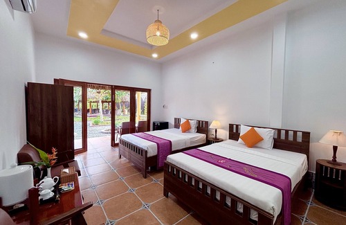 Giong Trom Hotel | Mango Home Riverside
