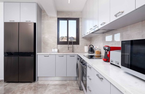 Kouklia Apartment | Marble Heights Residence by Nomads