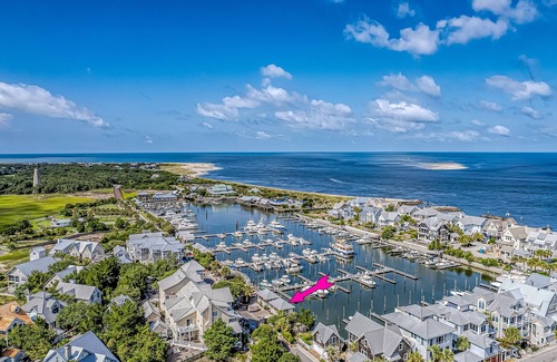 Bald Head Island Cottage | Marina view one bedroom cottage close to amenities on BHI. Walking distance to the NC lighthouse