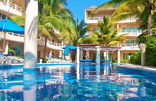 Puerto Aventuras Condo | Marina View waterfront Condo with resort style pool