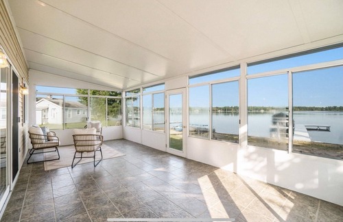 Gaylord House | Marvelous updated 4-bedroom lake house in Gaylord with sunset views and a beach