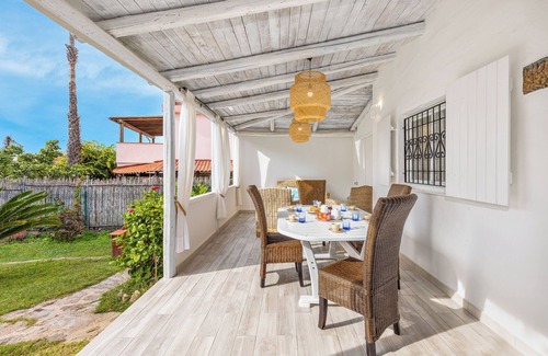Baia Caddinas House | Mediterranean Holiday Home with Wi-Fi, A/C, Garden & Terrace