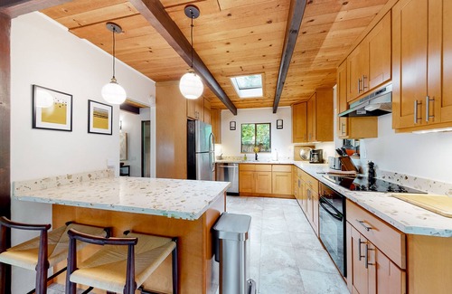 Gualala House | Mid-century home in the redwoods with expansive deck, garden & woodstove