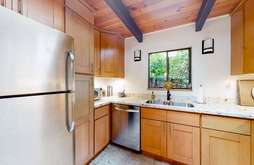 Gualala House | Mid-century home in the redwoods with expansive deck, garden & woodstove