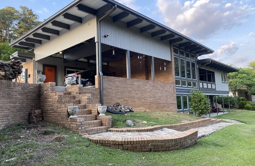 Terry Sanford House | Mid-Century Modern Luxury. Sleeps 12. Pool Table and Ping Pong Table.