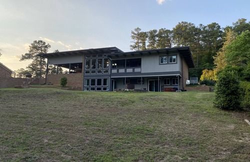 Terry Sanford House | Mid-Century Modern Luxury. Sleeps 12. Pool Table and Ping Pong Table.