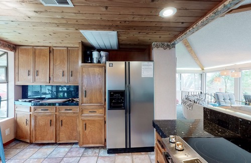 Marble Falls House | Mid-century modern lake house w/private waterfront pool & boat dock