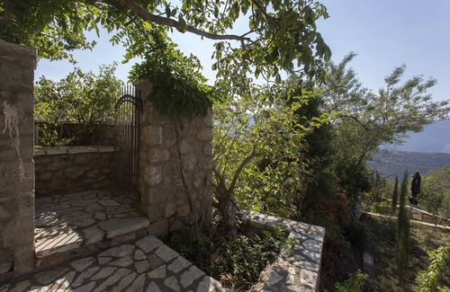 Arachova Apartment | Milia Room. Spacious and autonomous, ideal for a couple.
