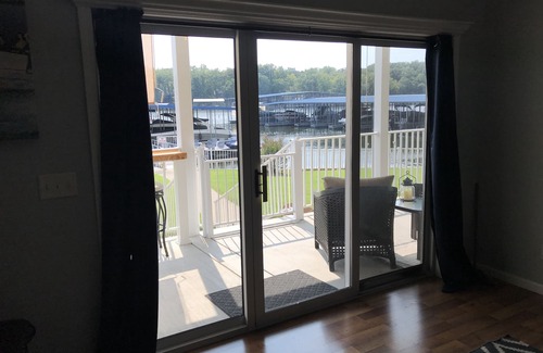 Sunrise Beach Condo | Minimal stairs! 15 second walk to pool, 45 second walk to 32x14 boat slip