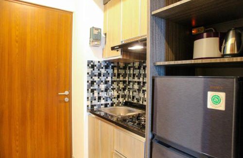 Bekasi Barat Apartment | Minimalist and Comfy 1BR Grand Kamala Lagoon Apartment By Travelio