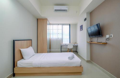Pondokcina Apartment | Minimalist Studio Room at Evenciio Margonda Apartment By Travelio