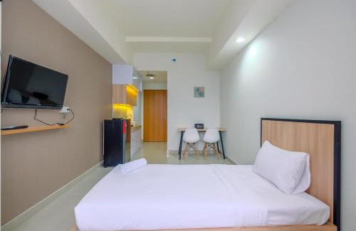 Pondokcina Apartment | Minimalist Studio Room at Evenciio Margonda Apartment By Travelio