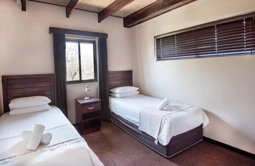 Windhoek Apartment | Minutes from Alte Feste and The Grove Mall of Namibia, Swimming Pools!