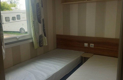 Jullouville House | Mobile home in campsite, ideal for families, close to beaches