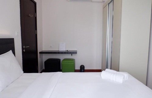 Pagedangan Apartment | Modern 1BR Casa De Parco Apartment By Travelio