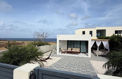 Lagun House | Modern 2-Bedr Oceanfront Villa with Hot Tub & Lounge Patio