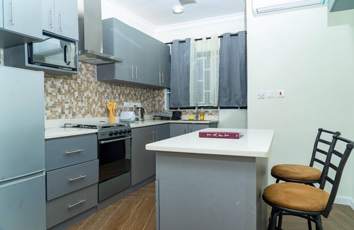 Amrahia Apartment | Modern 2-Bedroom Apartment Home on a Gated Compound with Backup Solar Power.