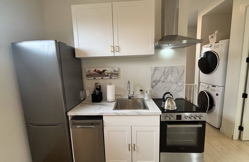 South Central Apartment | Modern 2BR Suite by the Beach | Walk to Hospital | Quiet & Bright Getaway