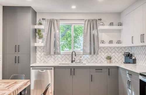 Crescent Heights Apartment | Modern 3 bed, 2 bath with an Unbeatable location and HOT TUB!