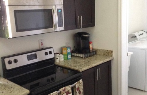 IronShore Estates Apartment | Modern 3 Bdrm - 3 1/2 Bath Apt. - Beach Pass/Pool/Gym/Wifi/Cable/Security/Gated