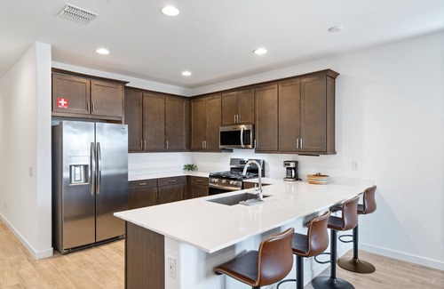 Goodyear House | Modern 3BR/2BA home in Goodyear with a community pool, pickleball courts, and EV charger! Less than a mile from Goodyear baseball stadium and close to other major venues, shopping, and golf courses!