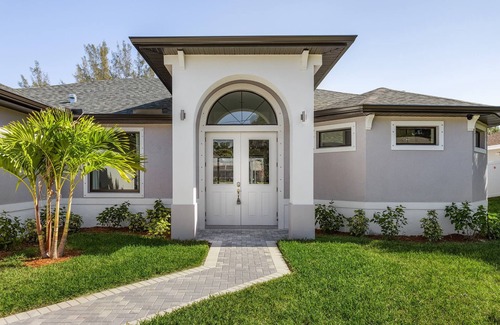 Trafalgar House | Modern 4BD/3BH Waterfront Home with Heated Pool and Golf Access and EV Charger