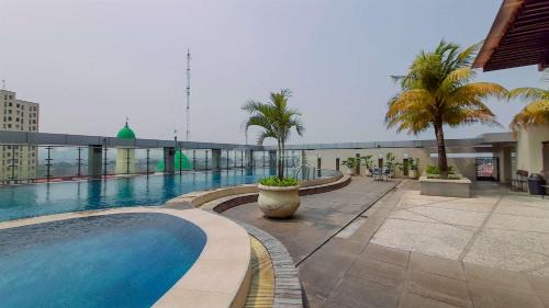 East Jakarta Apartment | Modern and Homey 2BR at MT Haryono Square Apartment By Travelio