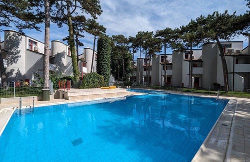 Lignano Sabbiadoro Apartment | Modern and fully equipped four room apartment with pool