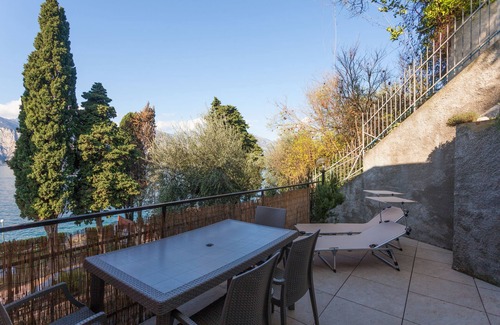 Cassone Apartment | Modern Apartment "Gennaker" On Lakeside with Terrace and View