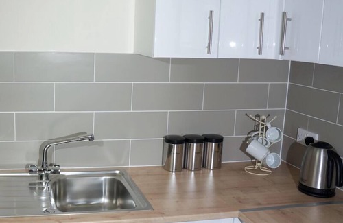 St Sampsons Apartment | Modern apartment in picturesque north Guernsey, by beautiful bay and Vale Castle