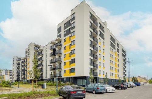 Ursus Apartment | Modern Apartment in Warsaw with Garden and Parking by Noclegi Renters