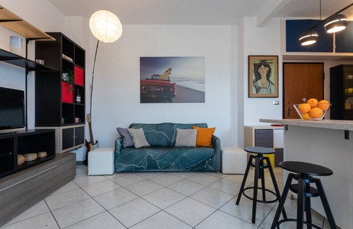 Borgo Dora Apartment | Modern Apartment with Balcony by Wonderful Italy