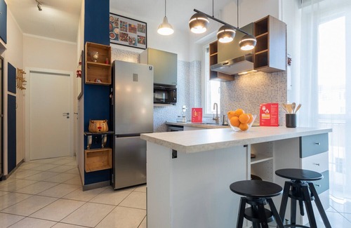Borgo Dora Apartment | Modern Apartment with Balcony by Wonderful Italy