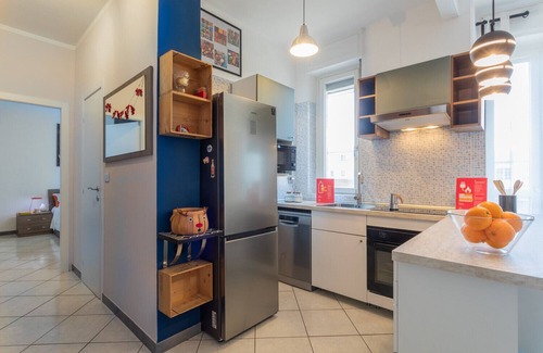Borgo Dora Apartment | Modern Apartment with Balcony by Wonderful Italy